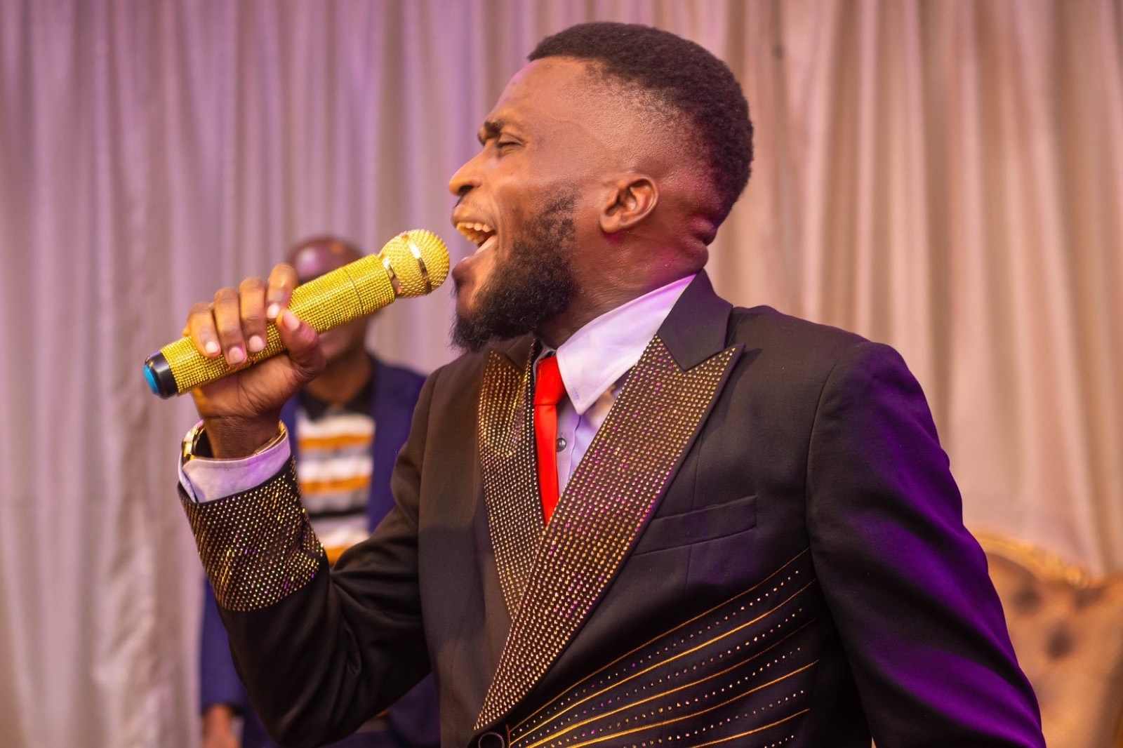 The Apostle ministering in worship